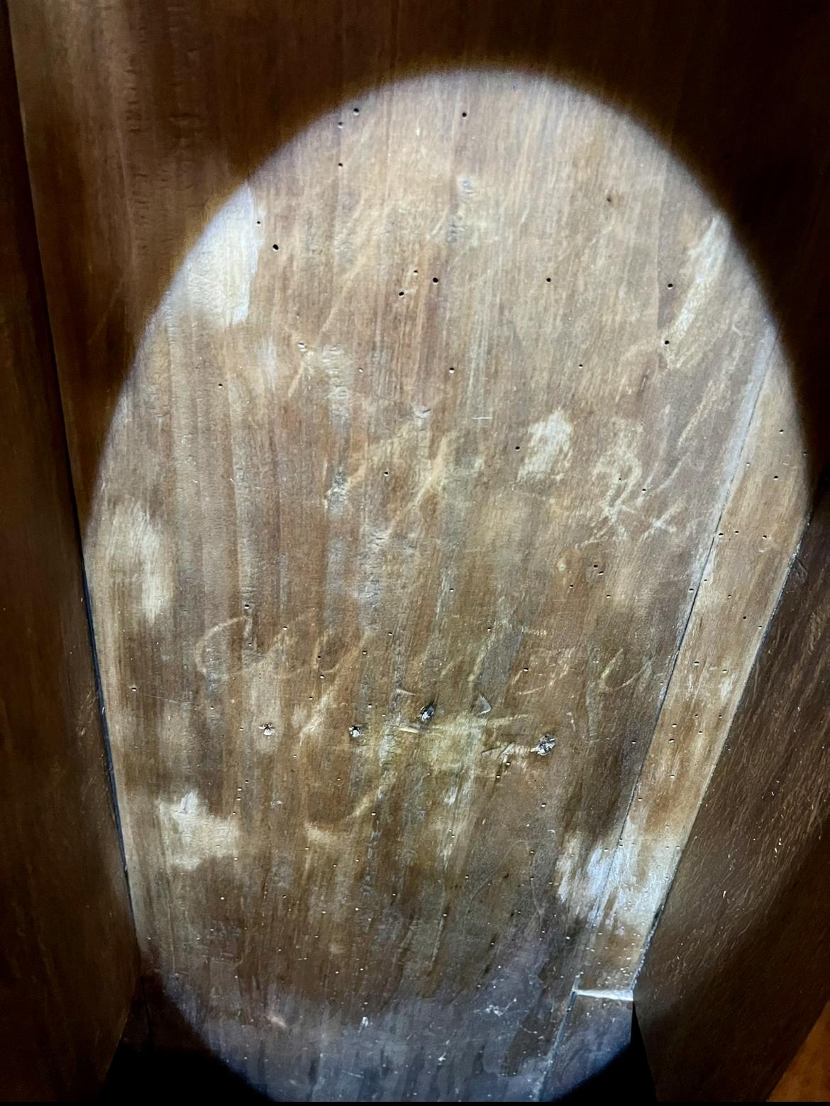 Another angle of the chalk markings under the flashlight beam