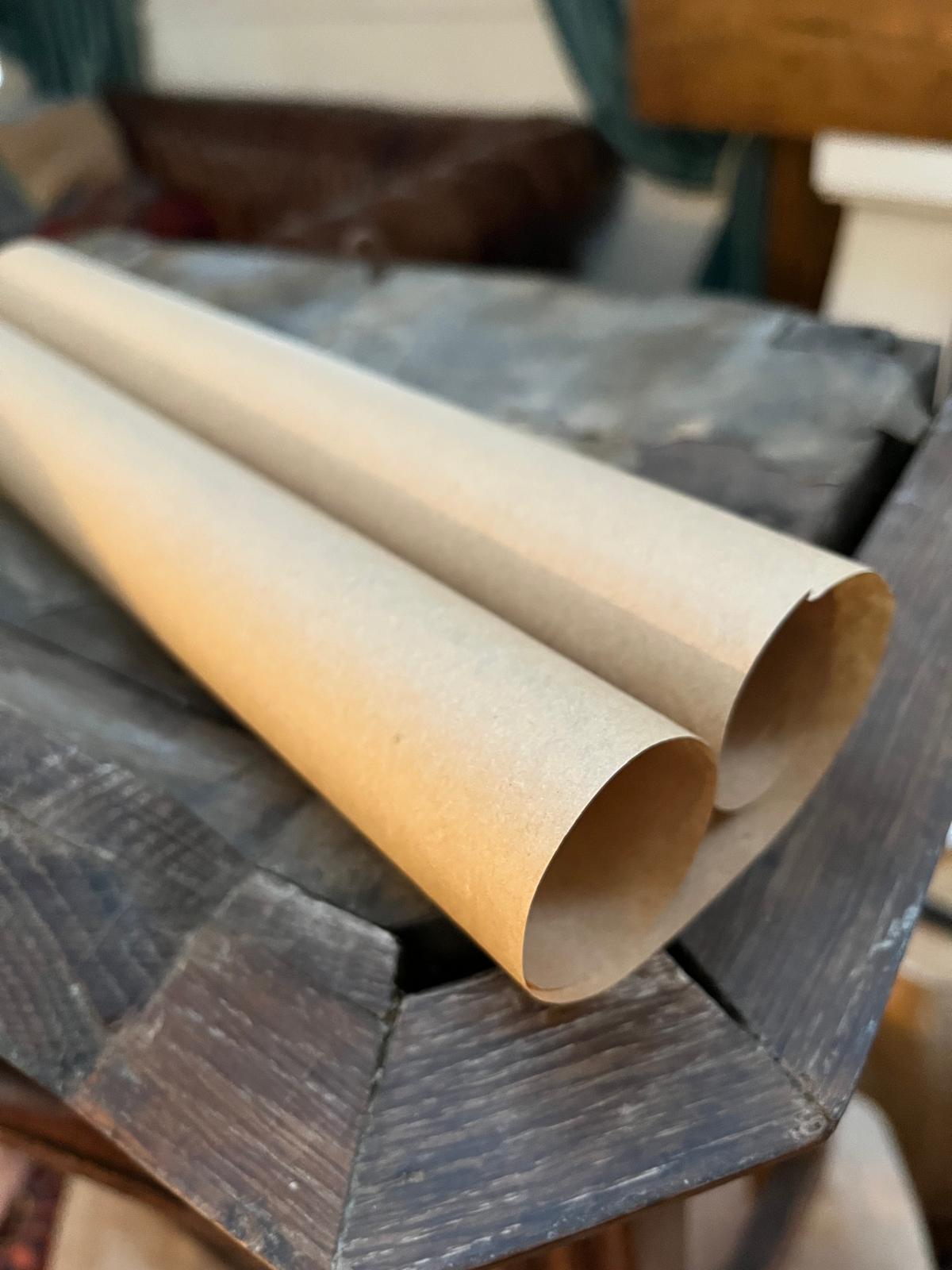 The roll kraft paper in its natural, curled state — before flattening