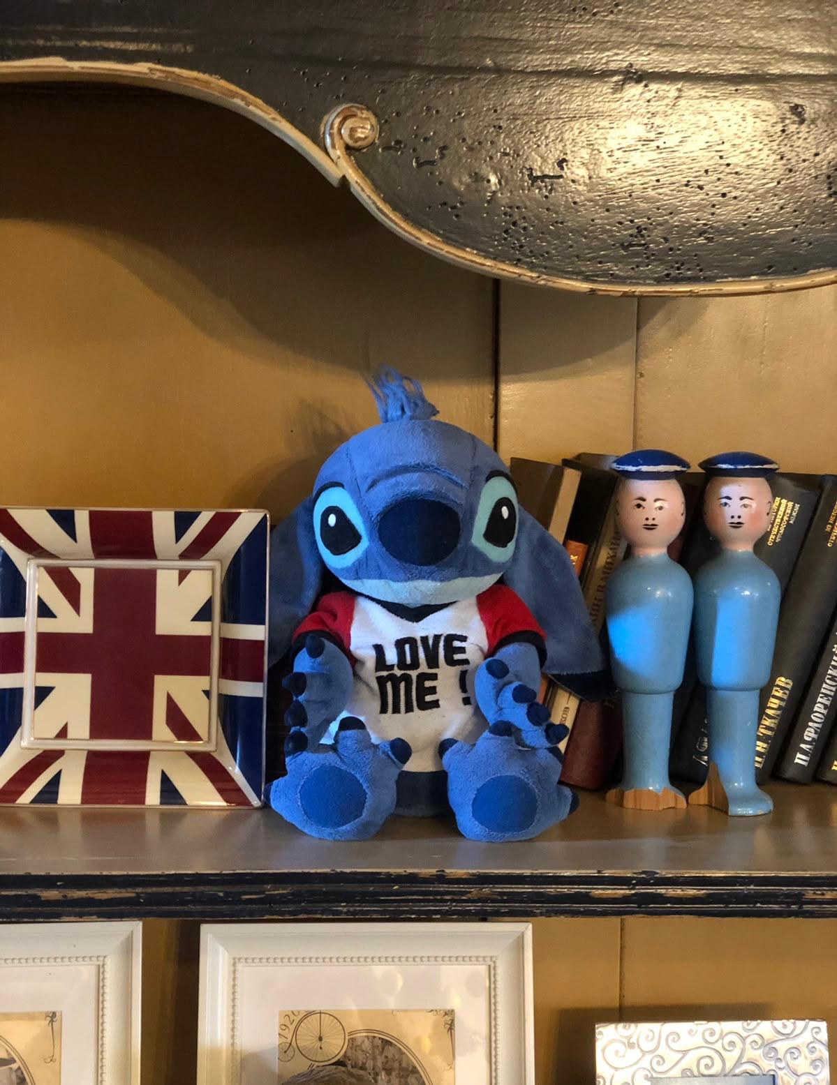 Stitch with the fold on his nose, on a shelf at Home