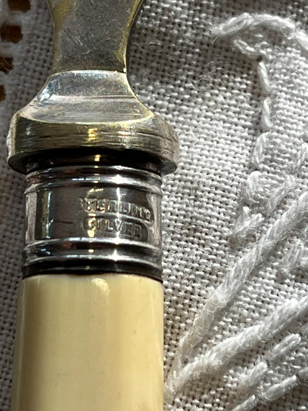 The STERLING SILVER mark on the ferrule, close up