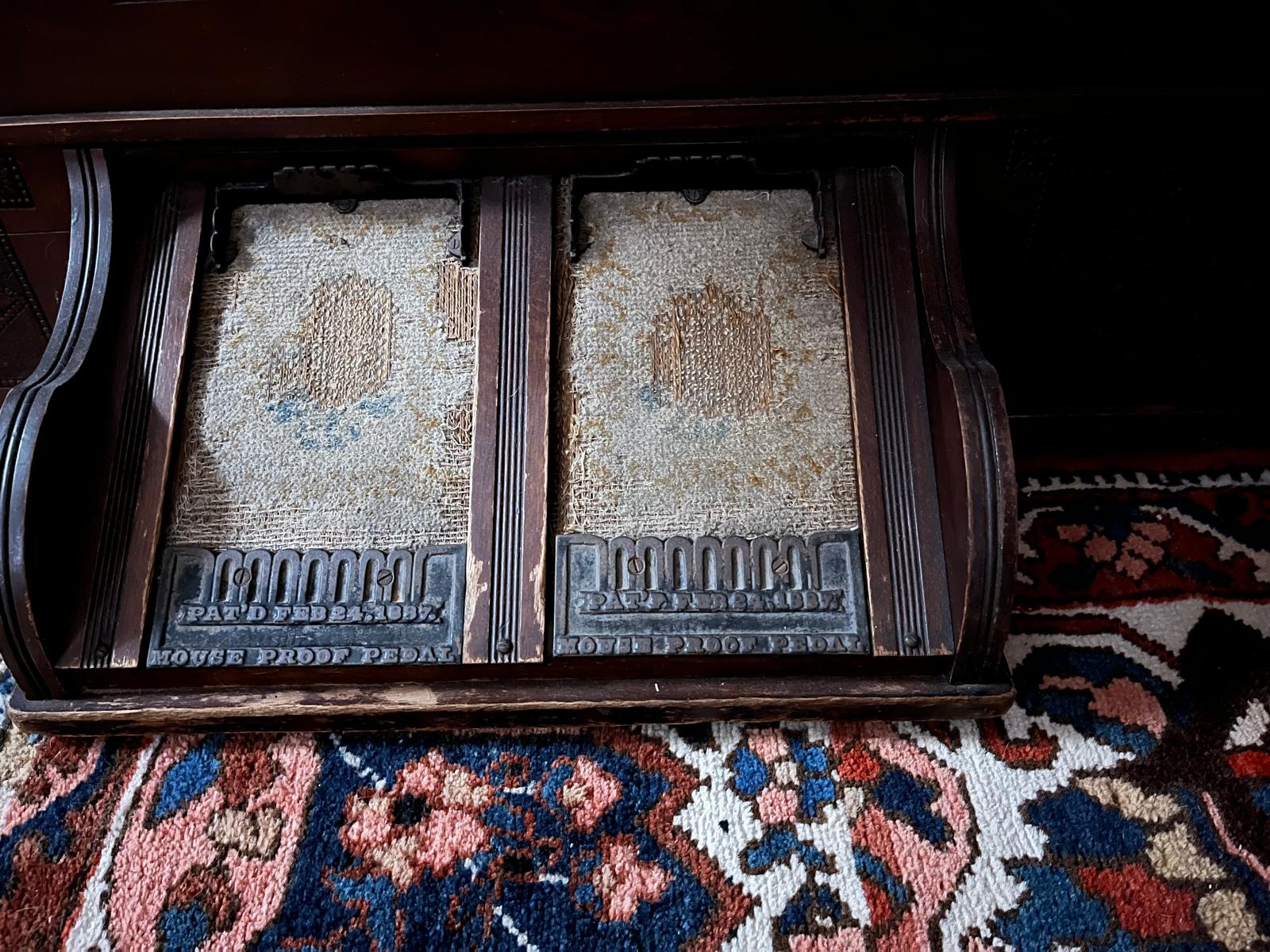 The cast-iron "Mouse Proof Pedal" mark on the pedals
